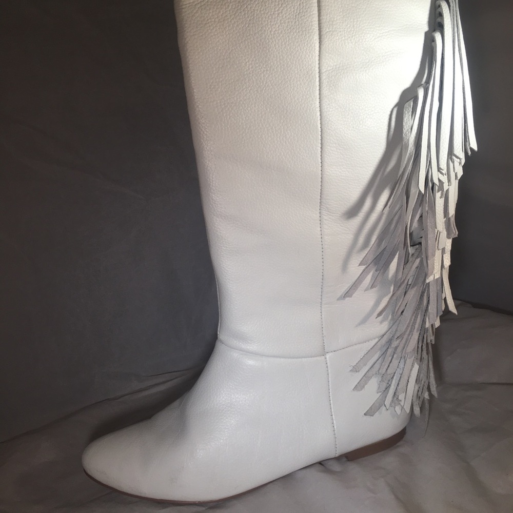 White leather knee high fringe boots